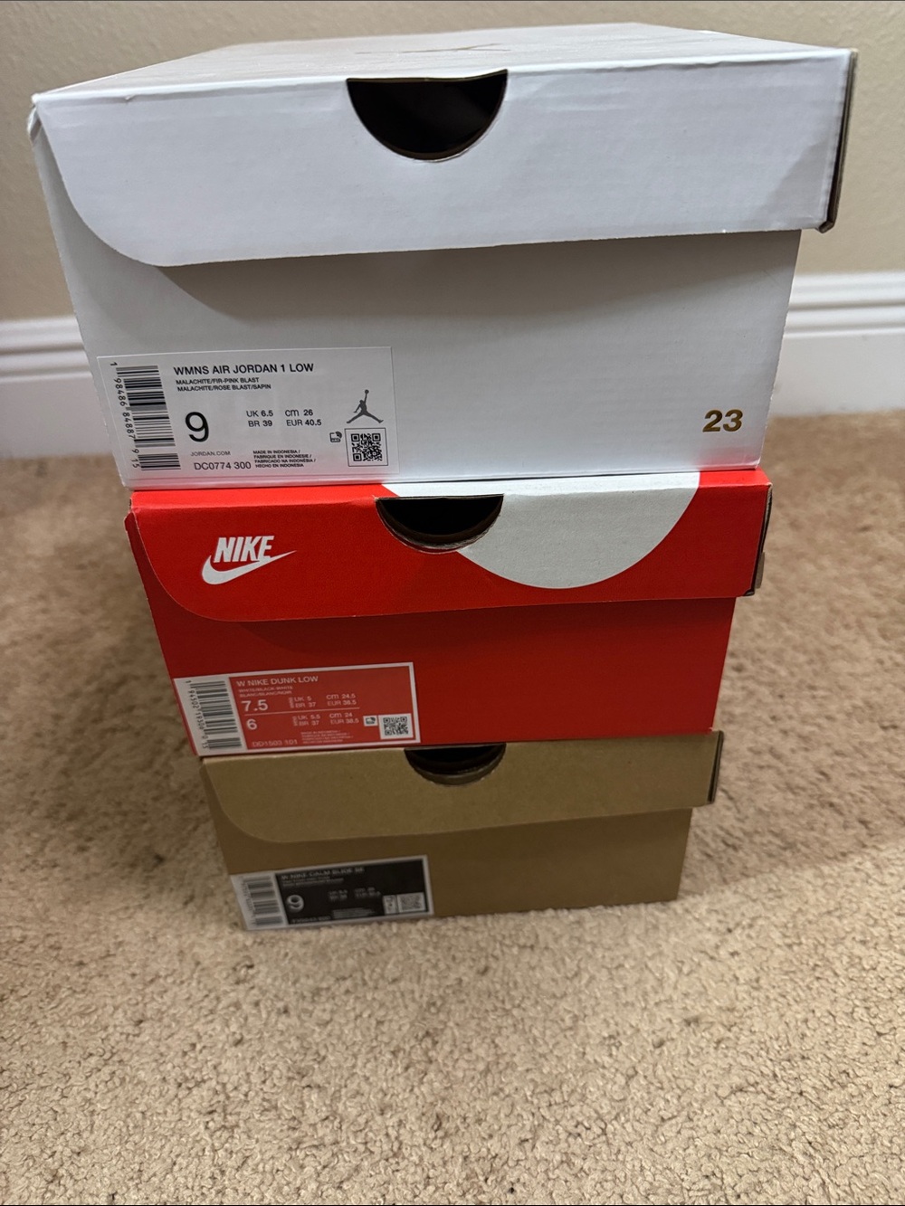Stacked Sneaker Boxes with Nike & Jordan Logos - White, Red, Brown